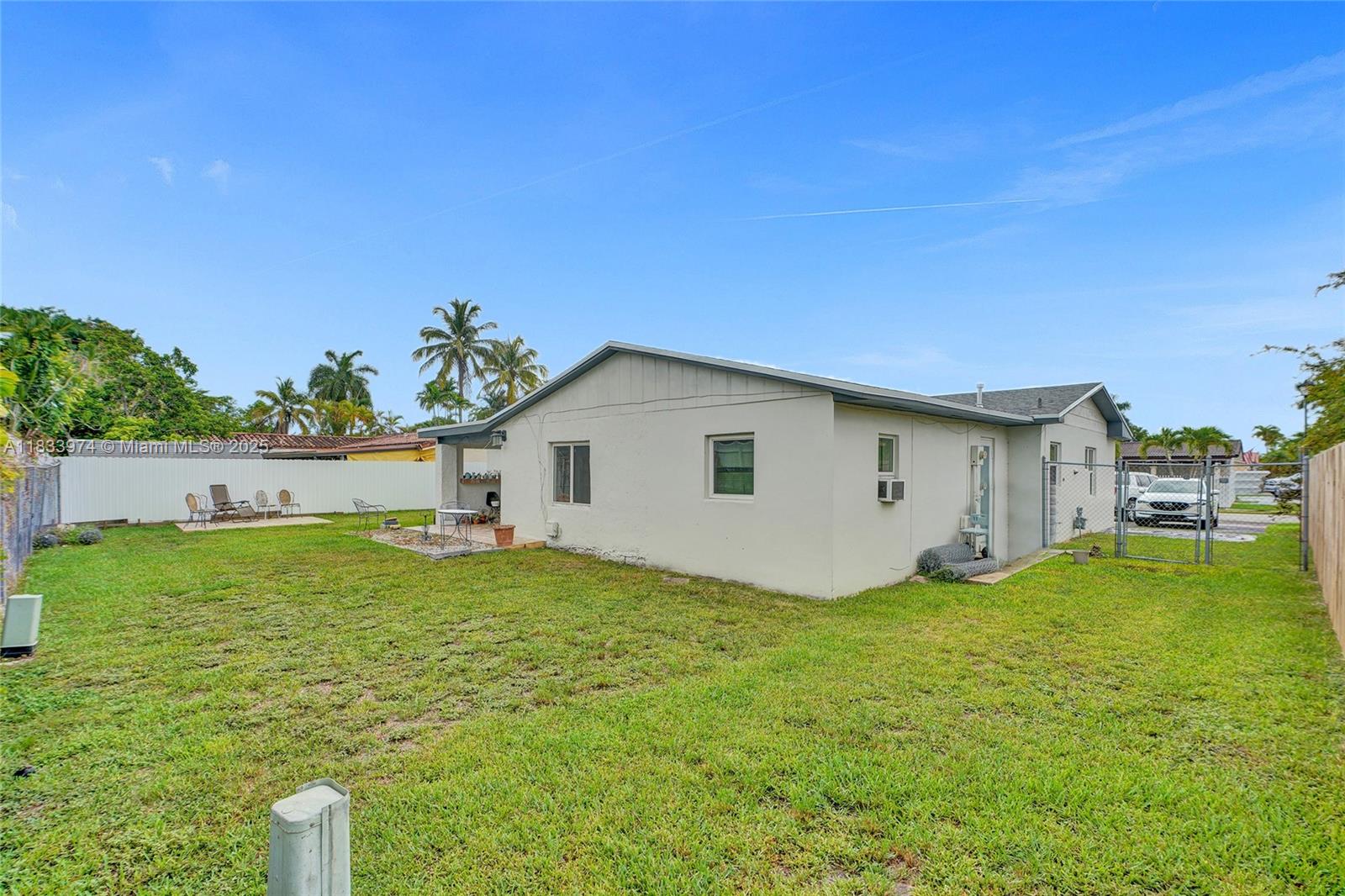 12763 Southwest 45th Terrace Miami, FL 33175 - Photo 27 of 30 a view of a house with a yard