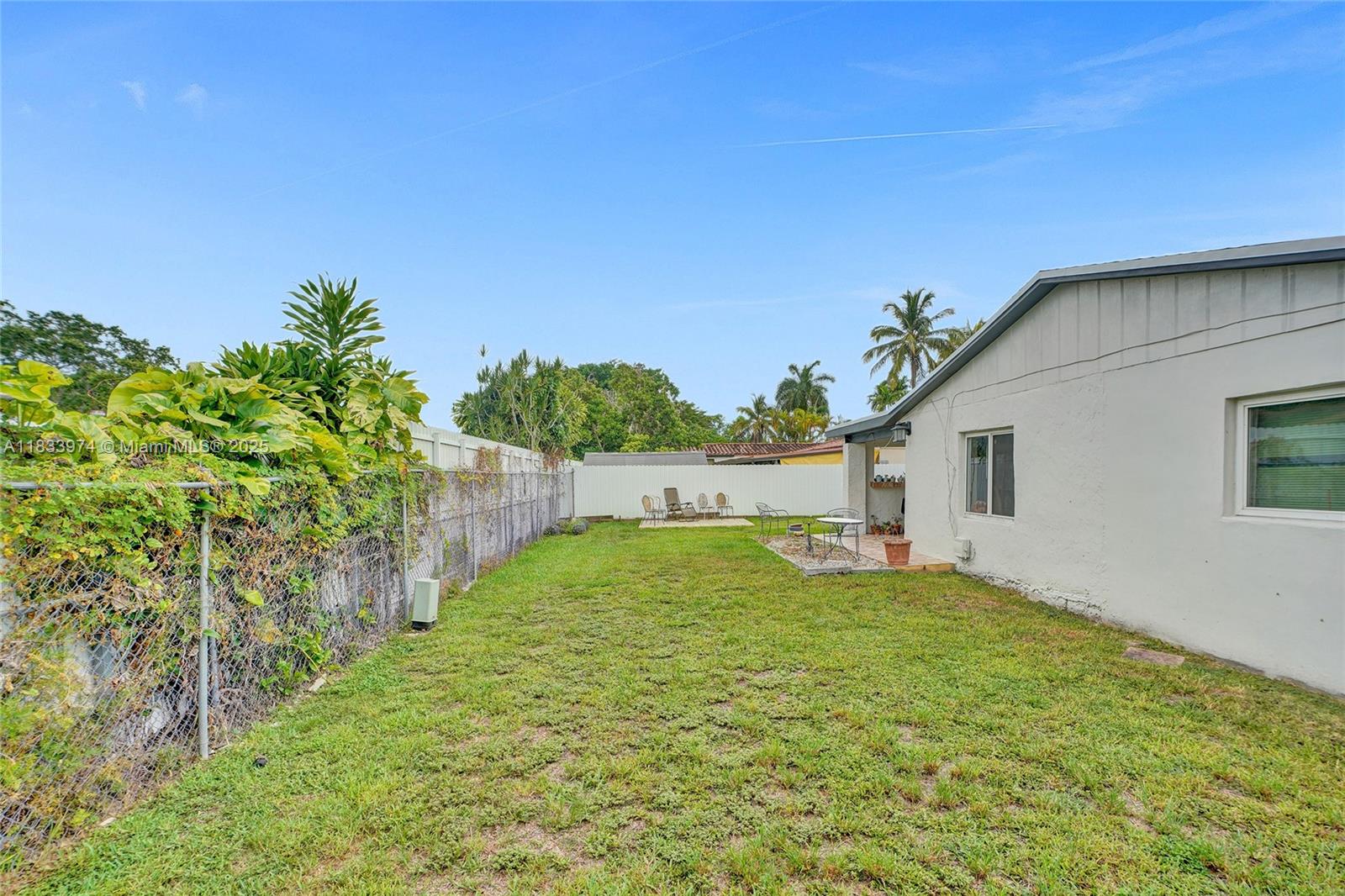 12763 Southwest 45th Terrace Miami, FL 33175 - Photo 28 of 30 a view of backyard with a garden and plants