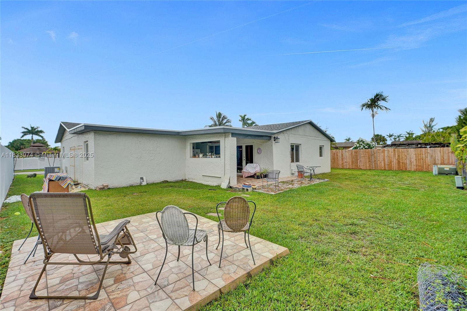 12763 Southwest 45th Terrace Miami, FL 33175 - Photo 30 of 30 a view of a house with backyard and sitting area