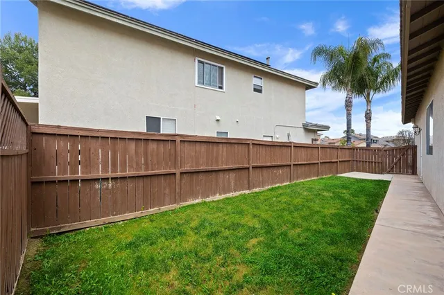 a view of a backyard with a garden