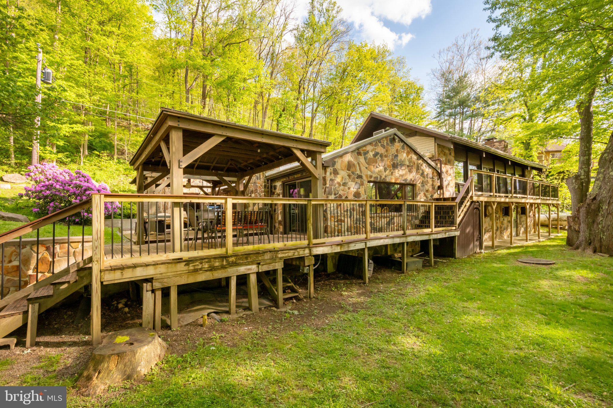 750 Lake Side Road Addison, PA 15411 - Photo 2 of 51 Charming stone retreat in nature's embrace.