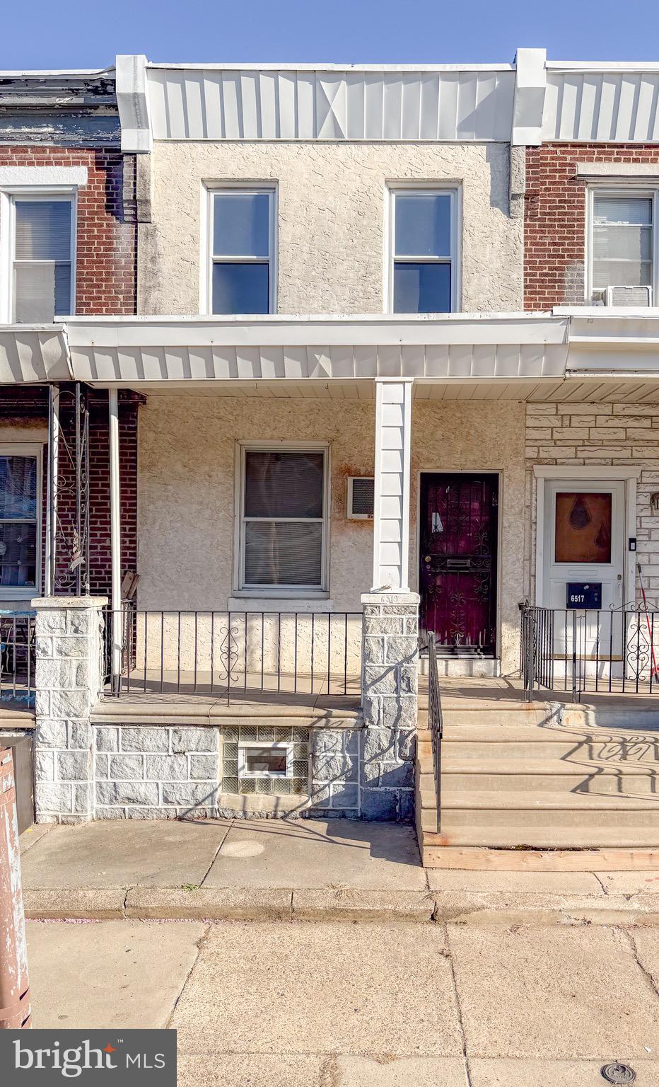 6519 Marsden Street Philadelphia, PA 19135 - Photo 1 of 24 a front view of a building with a outdoor space