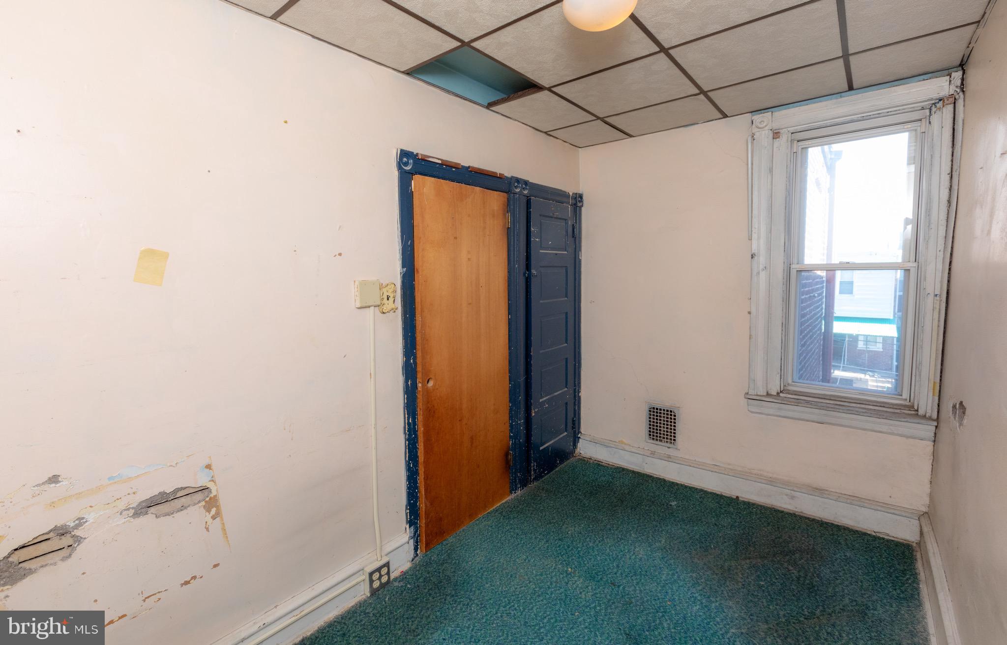 6519 Marsden Street Philadelphia, PA 19135 - Photo 15 of 24 an empty room with windows
