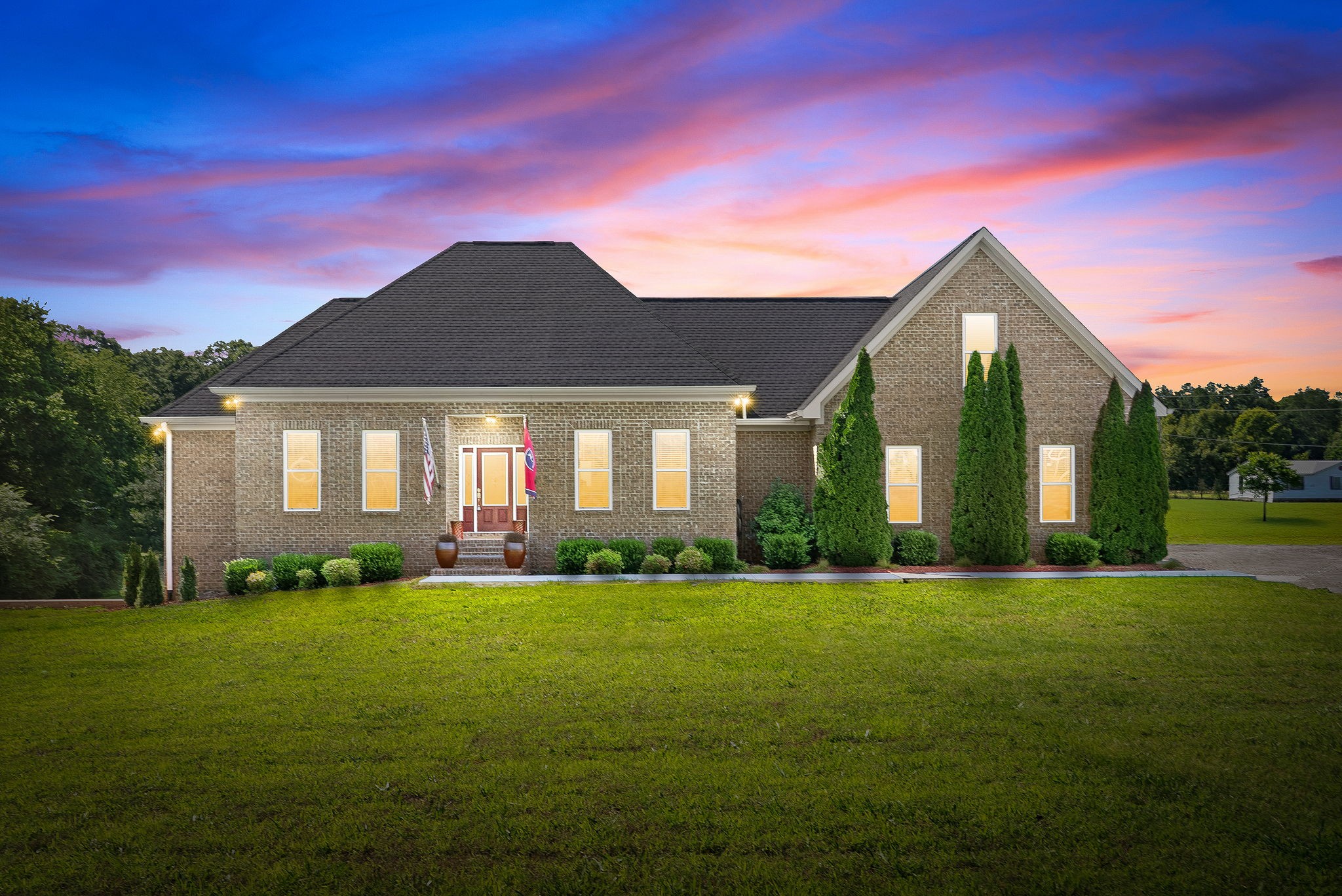 4940 Marion Road Cunningham, TN 37052 - Photo 43 of 43 a front view of a house with a yard