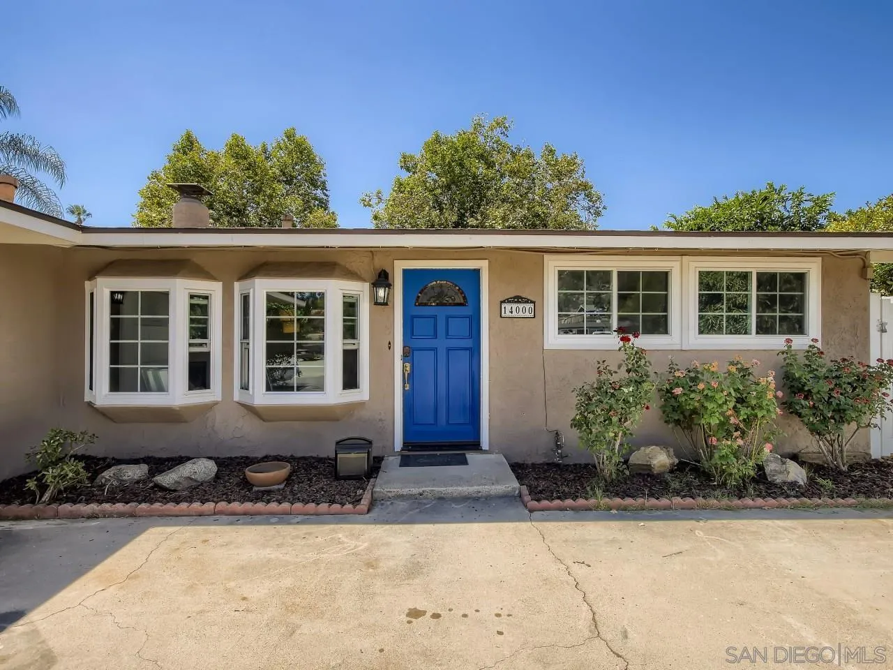 14000 Powers Road Poway, CA 92064 - Photo 1 of 27 a front view of a house with a yard