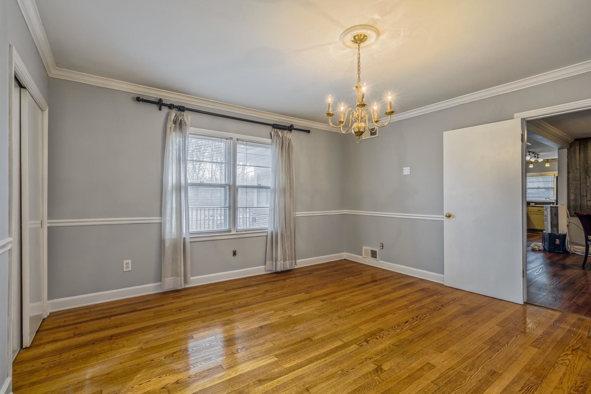 3087 James Road Memphis, TN 38128 - Photo 14 of 25 wooden floor in an empty room with a window