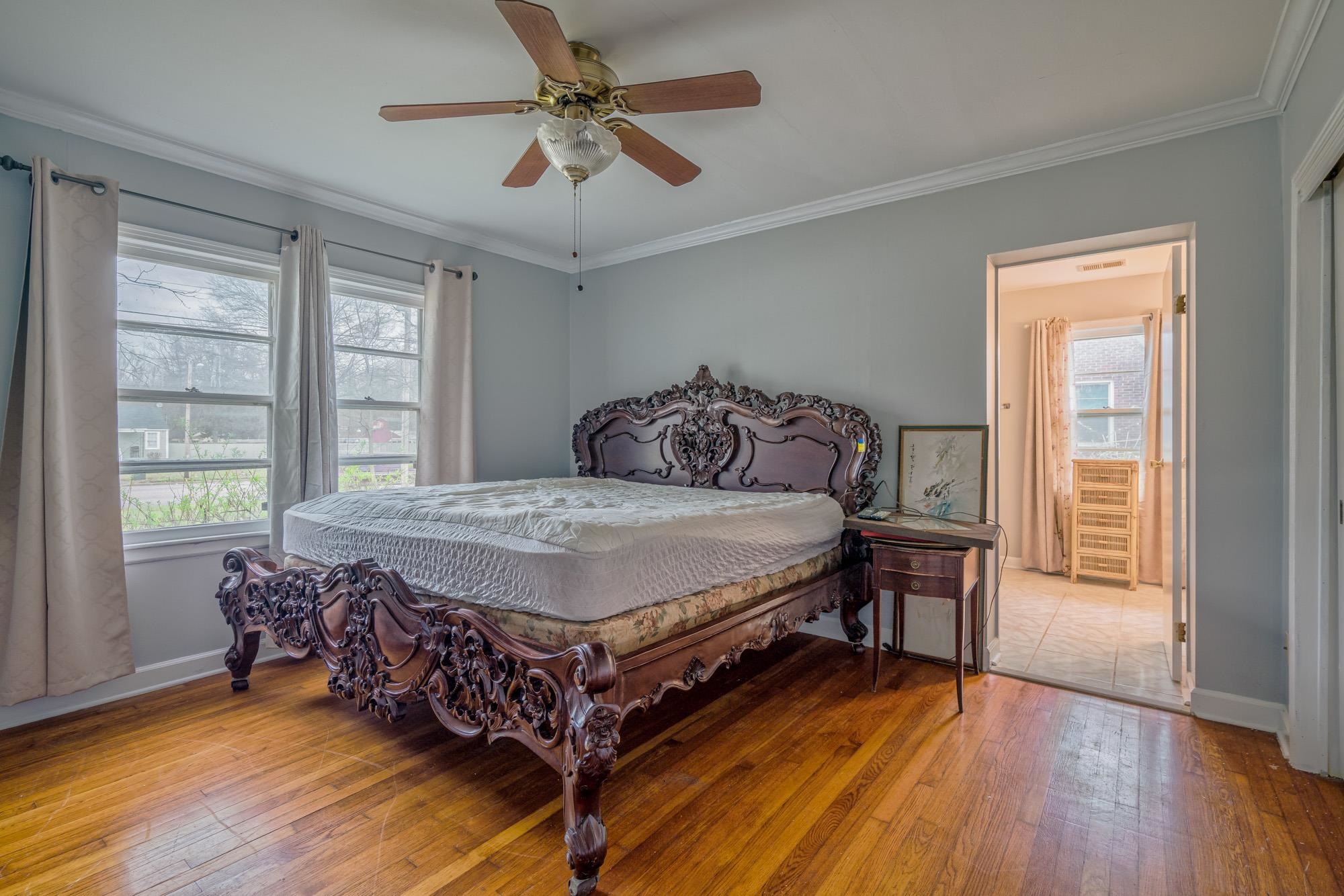 3087 James Road Memphis, TN 38128 - Photo 15 of 25 a bedroom with a bed chandelier and a window