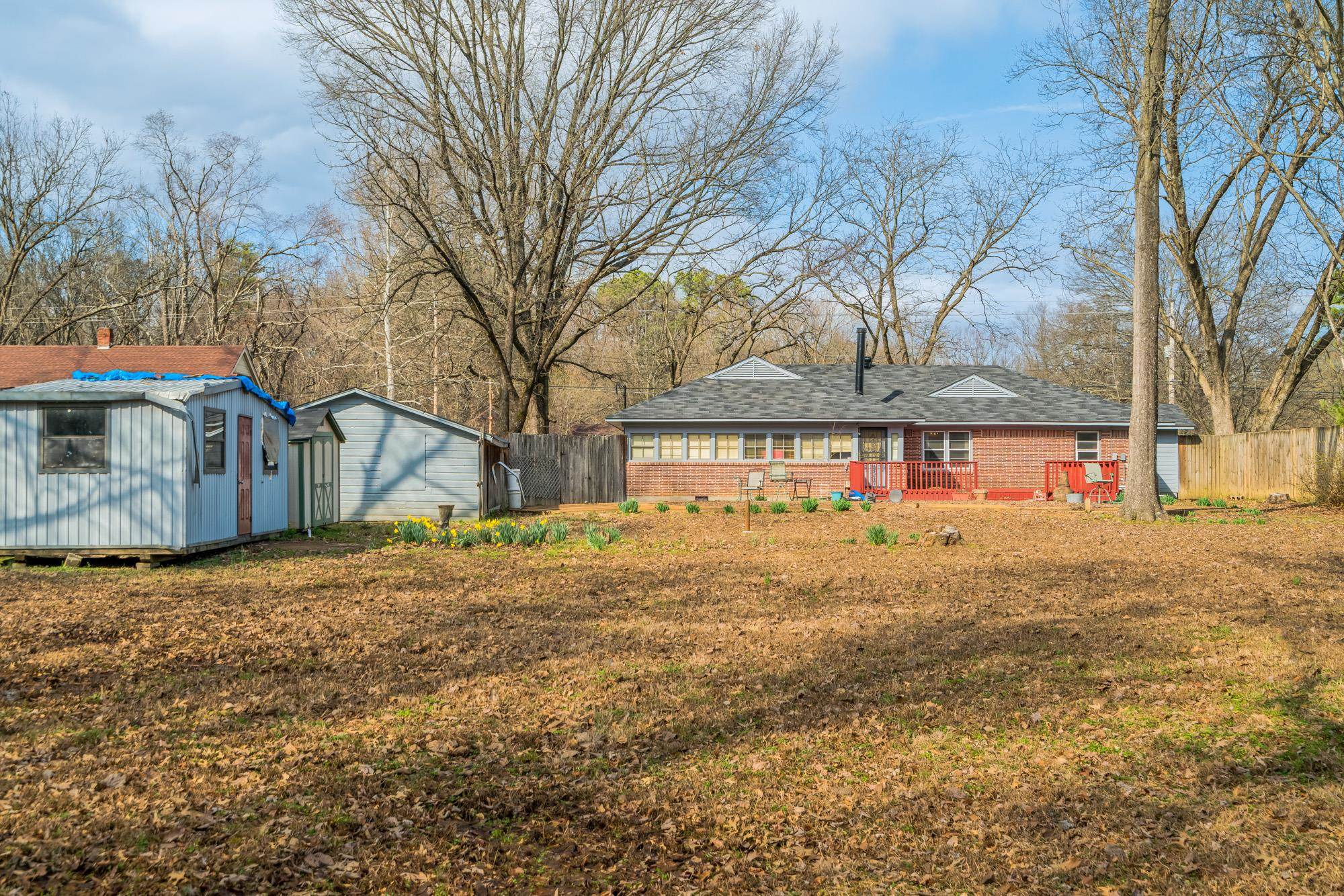 3087 James Road Memphis, TN 38128 - Photo 25 of 25 a view of a house with a yard covered with snow in the yard