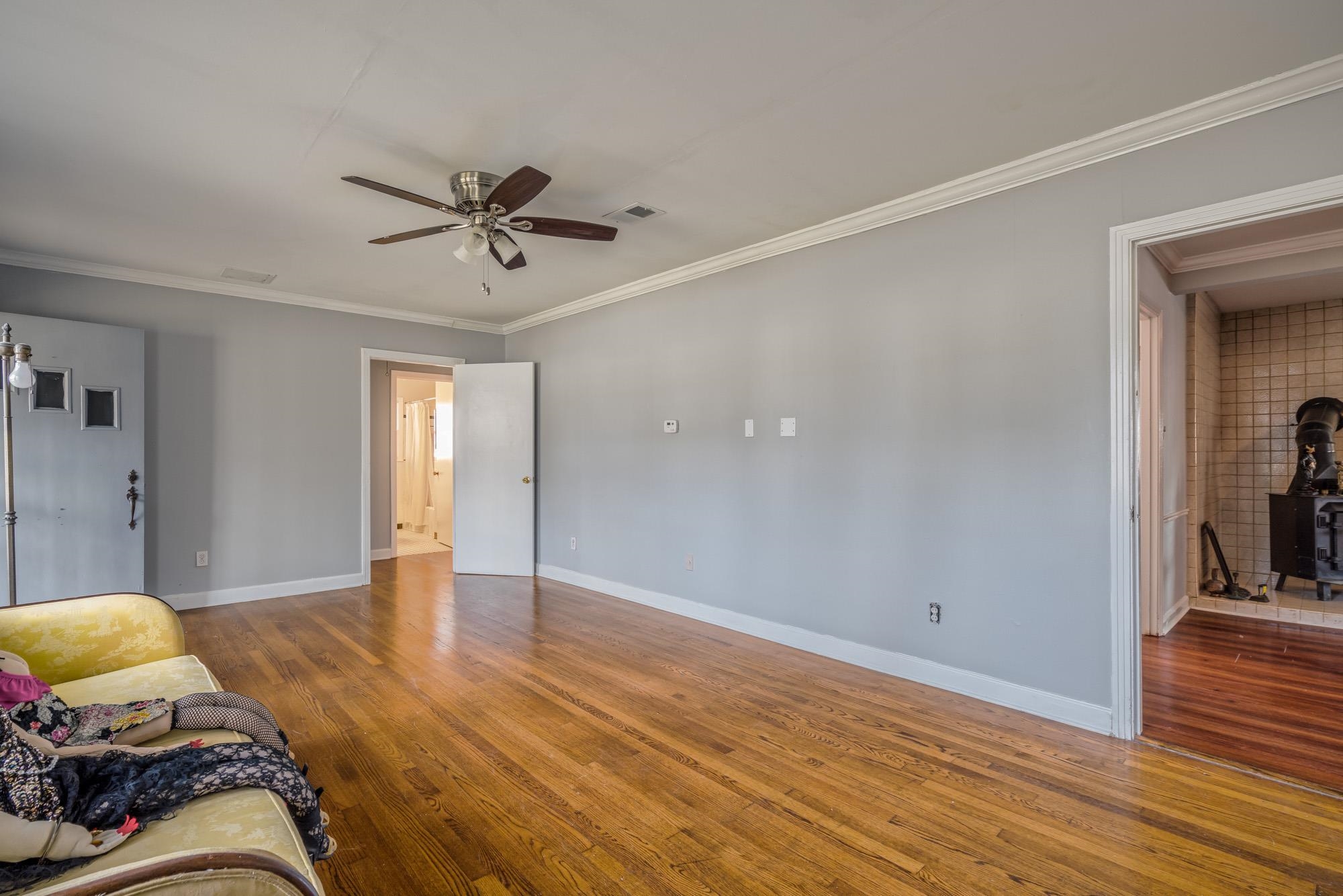 3087 James Road Memphis, TN 38128 - Photo 5 of 25 a view of livingroom with hardwood floor and a ceiling fan