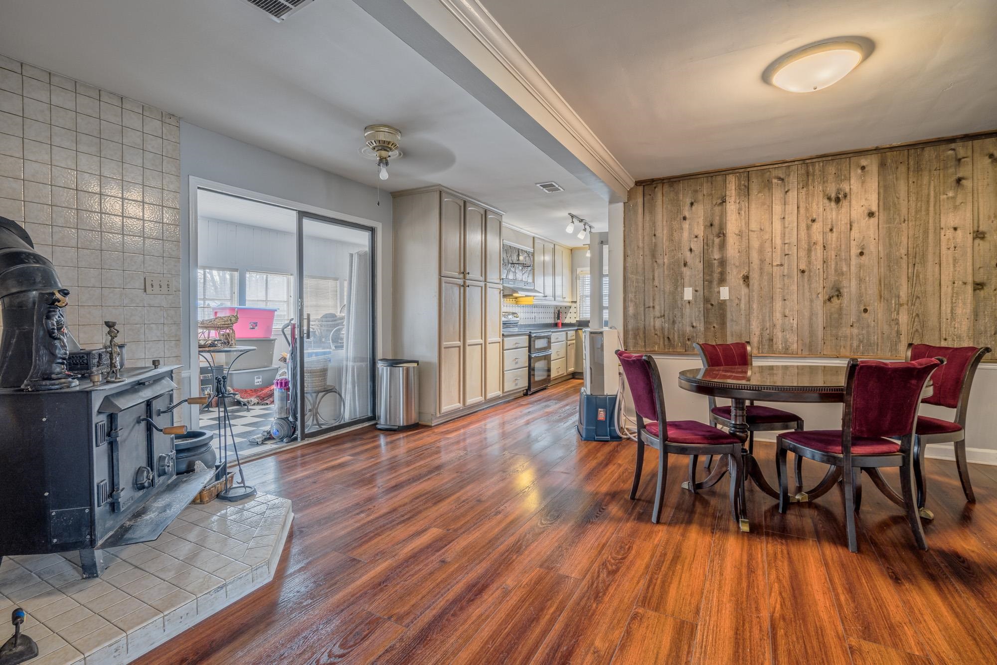 3087 James Road Memphis, TN 38128 - Photo 7 of 25 a view of a dining room with furniture and wooden floor