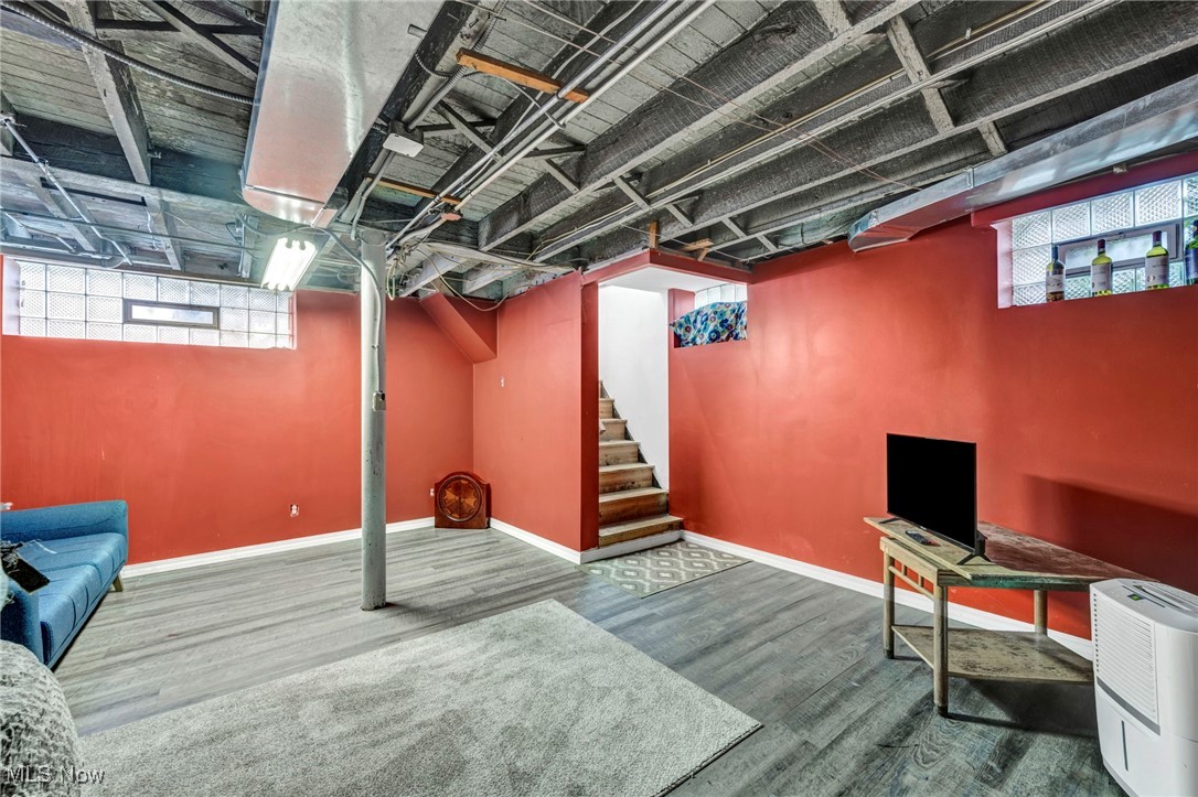 4743 Broadale Road Cleveland, OH 44109 - Photo 24 of 32 Basement with stairway and wood finished floors