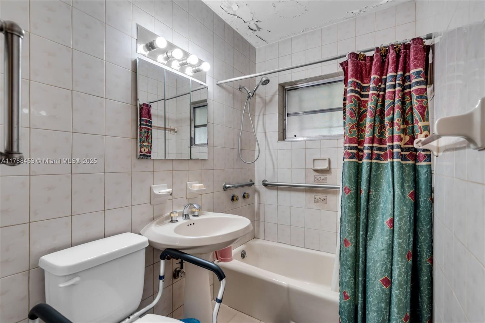 35 Southwest 60th Avenue Miami, FL 33144 - Photo 13 of 27 a bathroom with a sink toilet and shower
