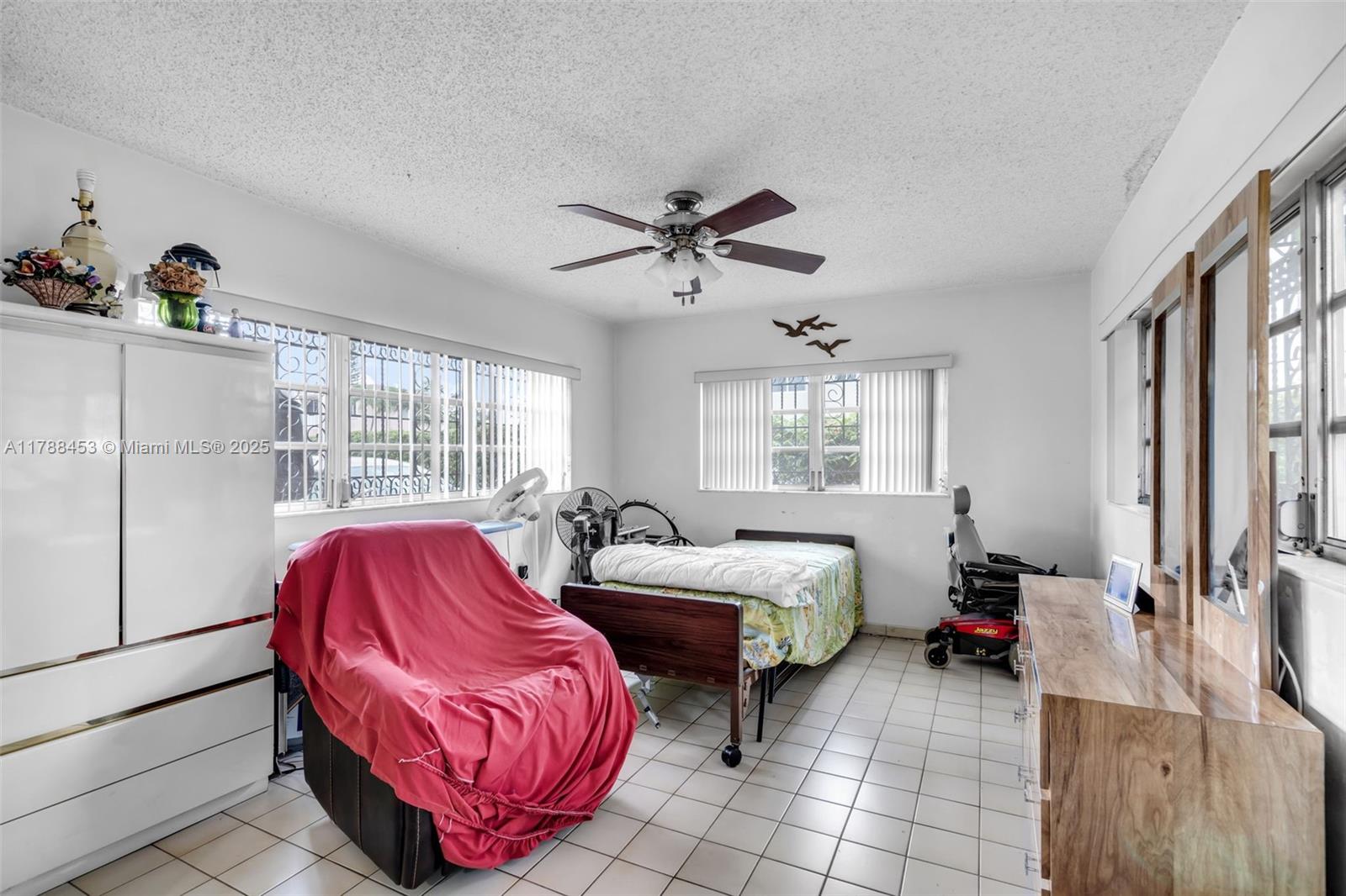 35 Southwest 60th Avenue Miami, FL 33144 - Photo 15 of 27 a living room with furniture and a window