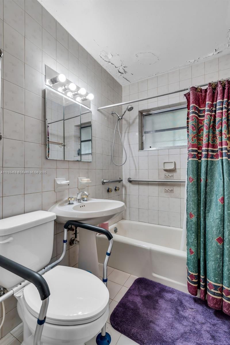 35 Southwest 60th Avenue Miami, FL 33144 - Photo 17 of 27 a bathroom with a sink toilet and shower