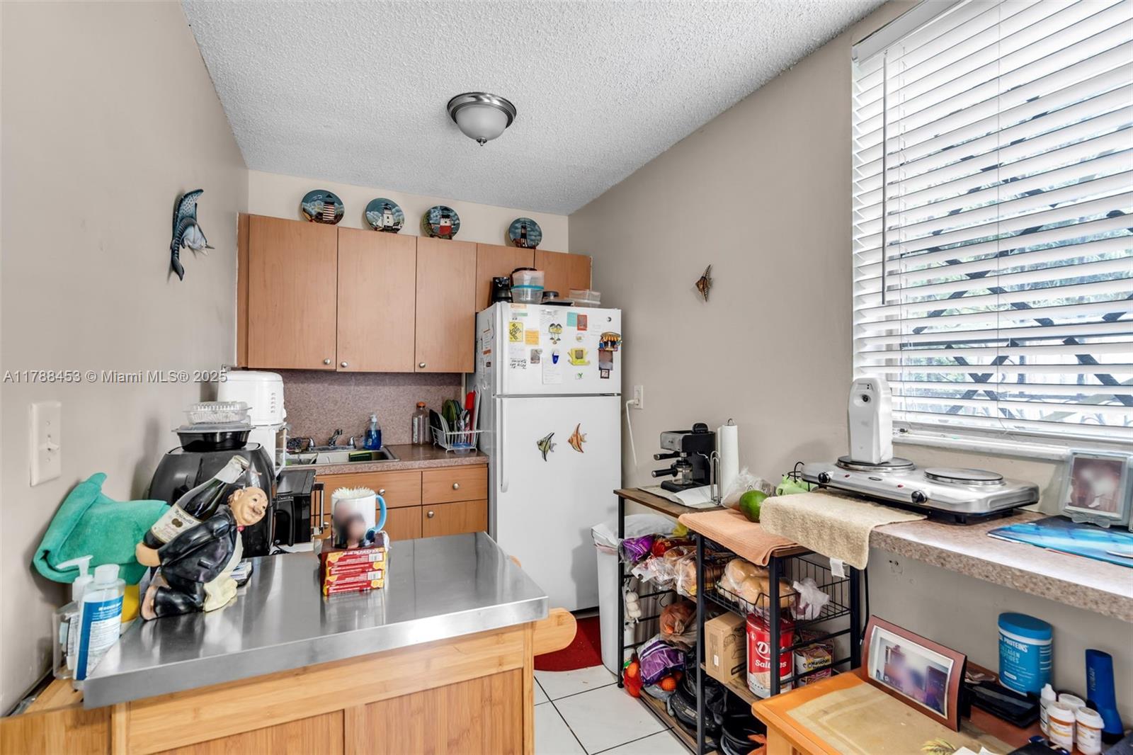 35 Southwest 60th Avenue Miami, FL 33144 - Photo 19 of 27 a room with storage and utility