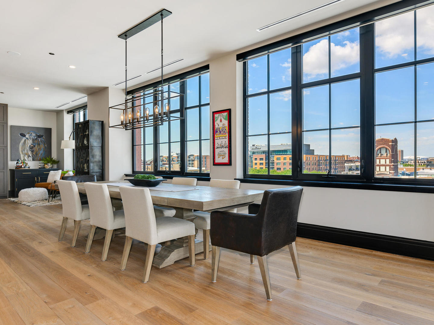 1109 West Washington Boulevard, Unit 7A Chicago, IL 60607 - Photo 12 of 41 a view of a dining room with furniture window and wooden floor