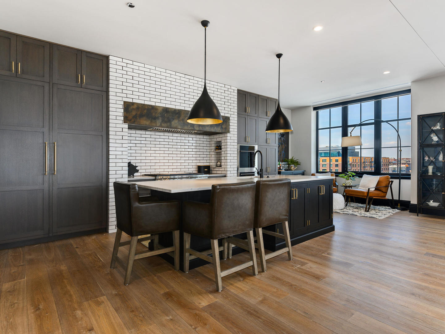 1109 West Washington Boulevard, Unit 7A Chicago, IL 60607 - Photo 17 of 41 a view of a dining room with furniture window and wooden floor