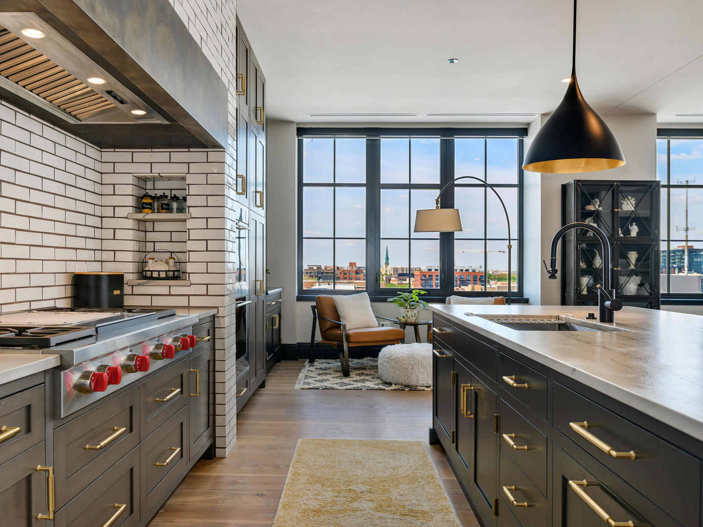 1109 West Washington Boulevard, Unit 7A Chicago, IL 60607 - Photo 21 of 41 a kitchen with stainless steel appliances a sink and a stove