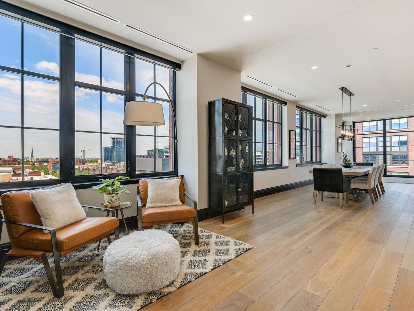 1109 West Washington Boulevard, Unit 7A Chicago, IL 60607 - Photo 23 of 41 a living room with furniture and large windows