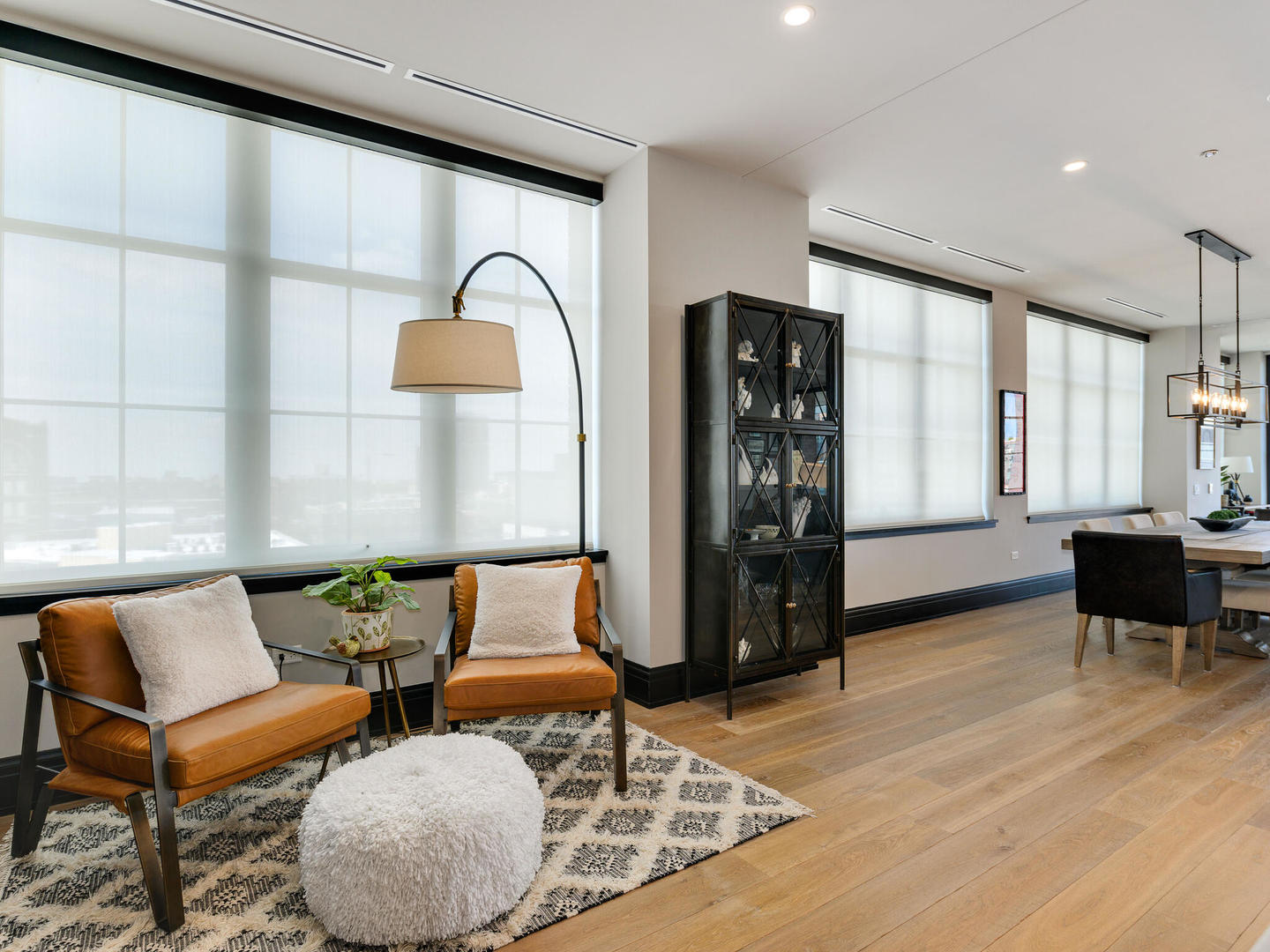 1109 West Washington Boulevard, Unit 7A Chicago, IL 60607 - Photo 24 of 41 a living room with furniture and wooden floor