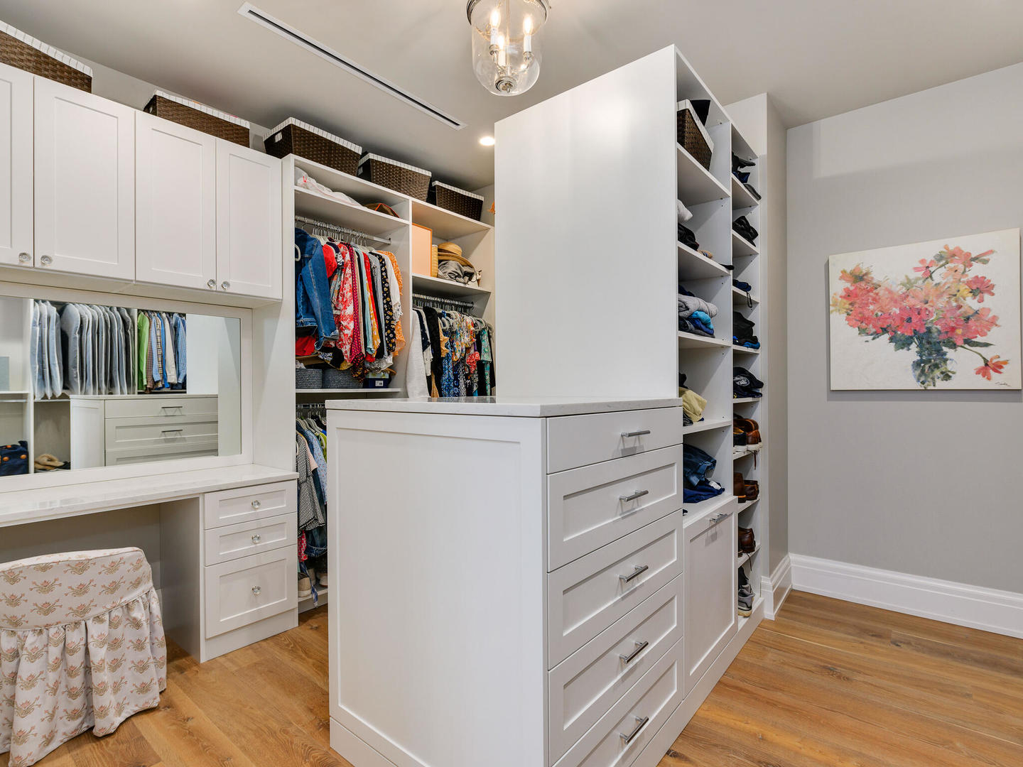 1109 West Washington Boulevard, Unit 7A Chicago, IL 60607 - Photo 32 of 41 a view of walk in closet with clothes and shoes