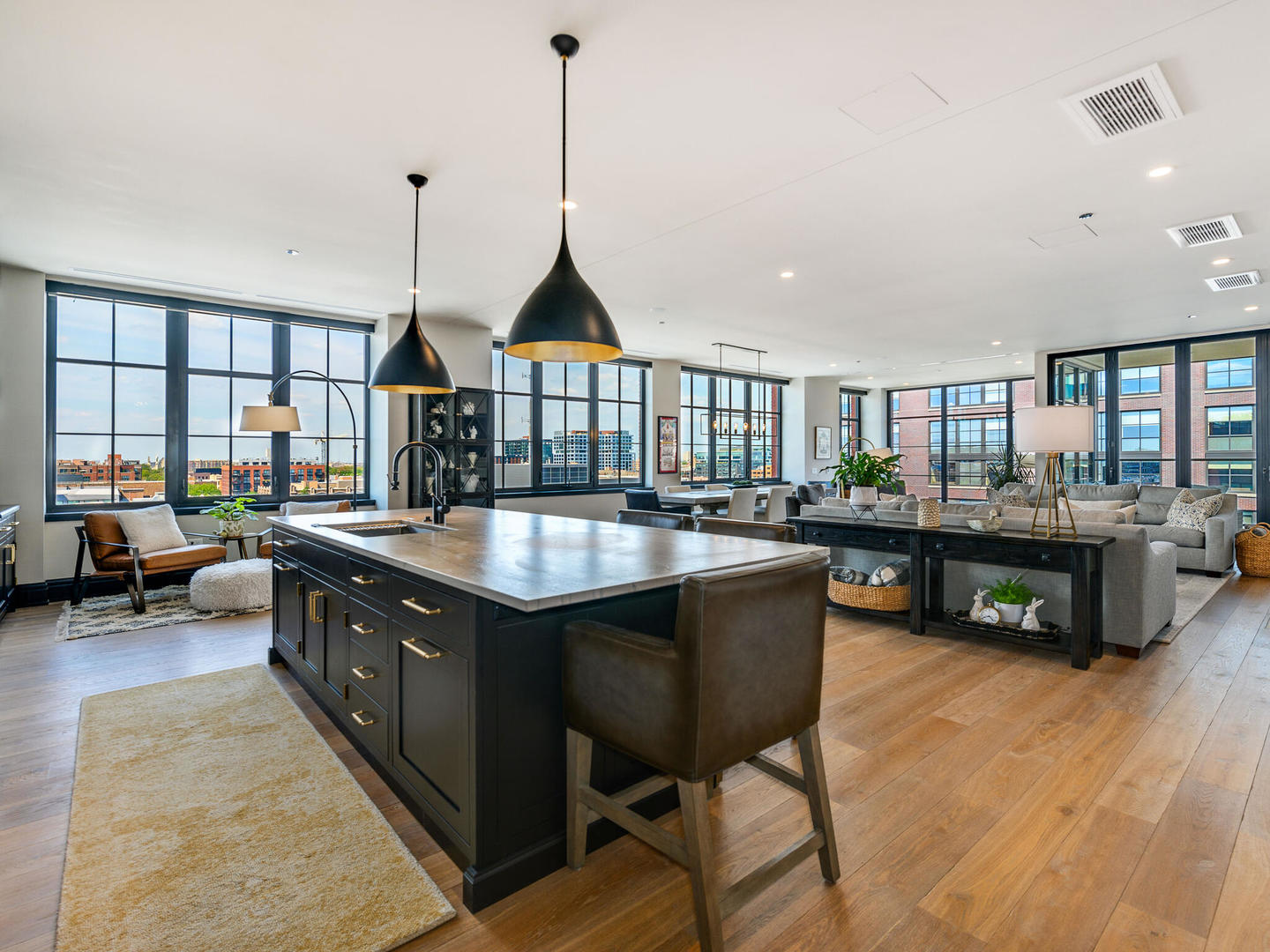 1109 West Washington Boulevard, Unit 7A Chicago, IL 60607 - Photo 6 of 41 a kitchen with stainless steel appliances granite countertop a stove top oven a sink dishwasher and a wooden cabinets