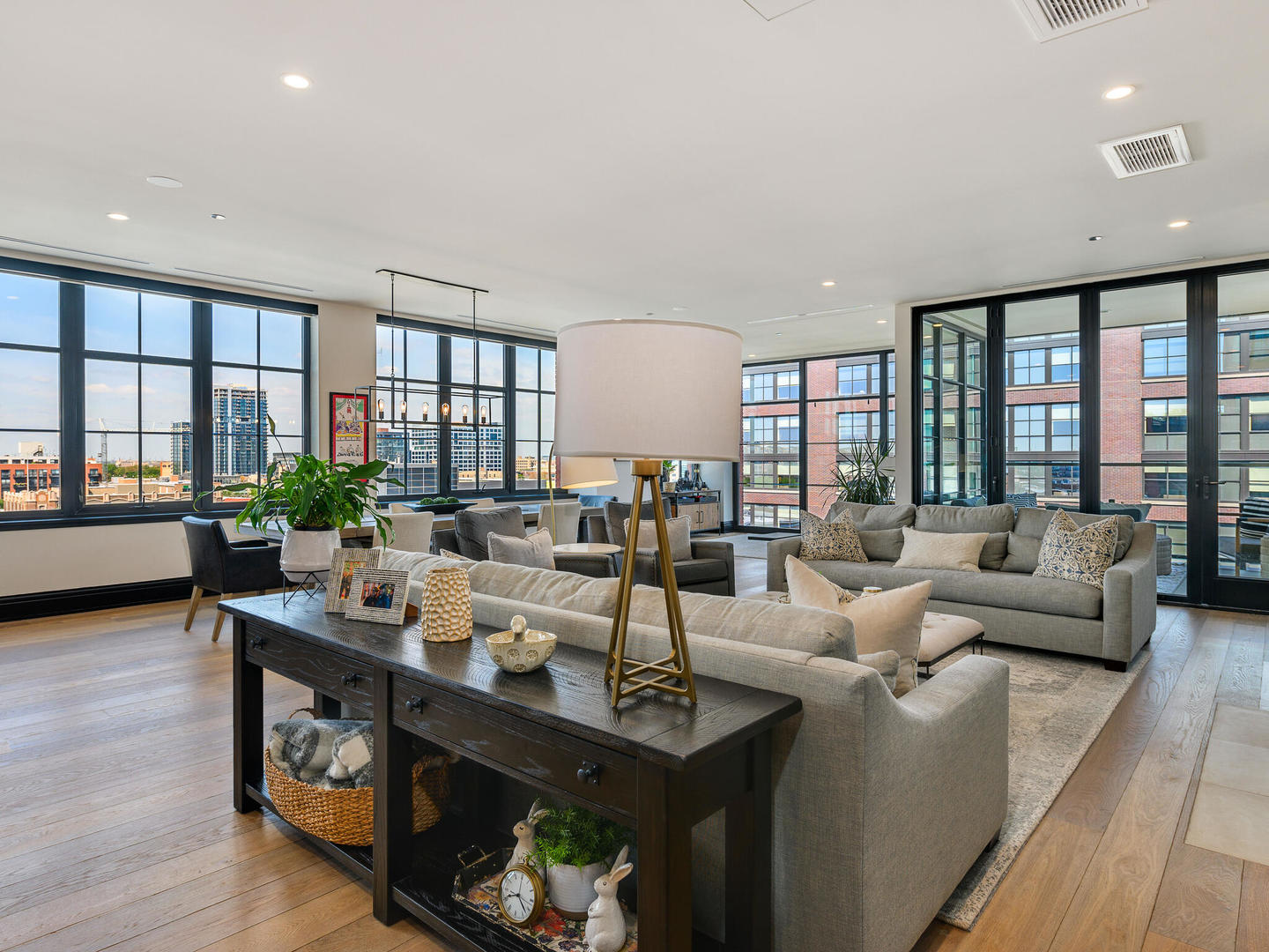 1109 West Washington Boulevard, Unit 7A Chicago, IL 60607 - Photo 8 of 41 a living room with furniture and a large window