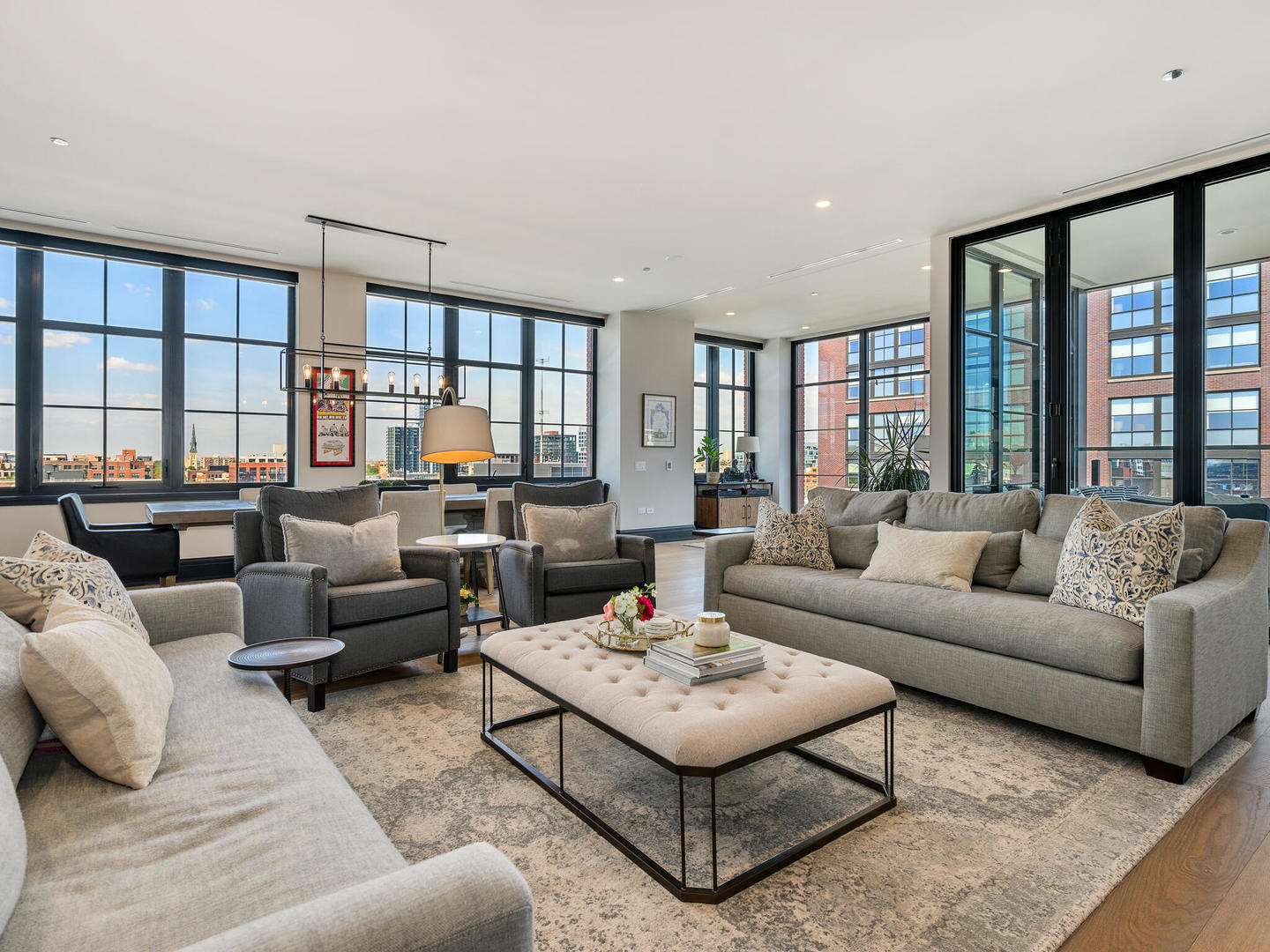 1109 West Washington Boulevard, Unit 7A Chicago, IL 60607 - Photo 9 of 41 a living room with furniture and a large window