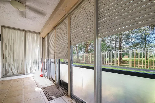 a view of a room with a large window