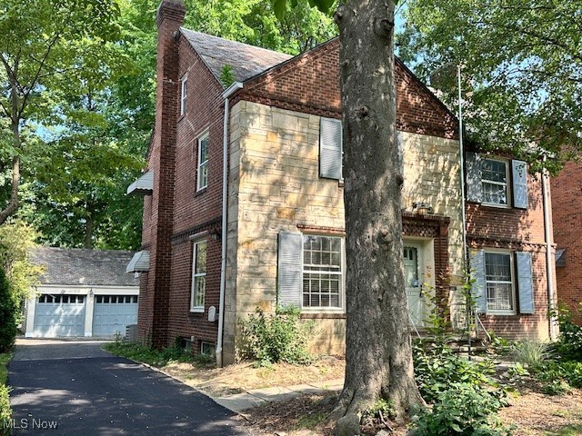4065 Conover Road Cleveland, OH 44118 - Photo 2 of 24 View of front facade with a garage
