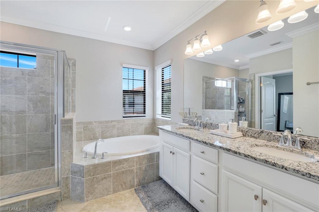 1141 Antaras Court North, Unit 25 Naples, FL 34113 - Photo 13 of 43 Primary Bath