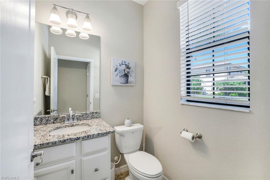 1141 Antaras Court North, Unit 25 Naples, FL 34113 - Photo 17 of 43 Powder Room