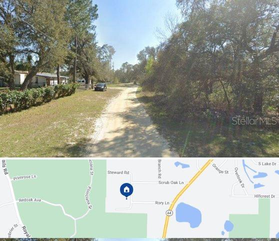 Toms Pond Road Eustis, FL 32736 - Photo 4 of 5 a view of an outdoor space and a lake view