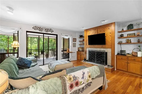 a kitchen with lots of different colored cloths