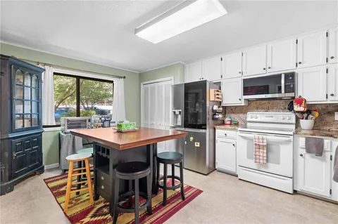 a room with furniture and window