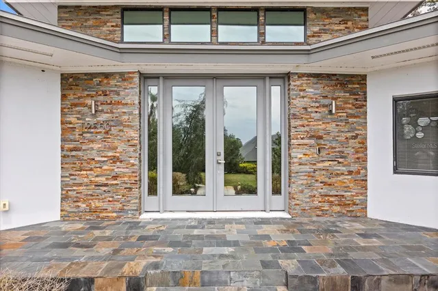 $1,399,000 | 12550 Lakeshore Drive, Clermont, FL 34711