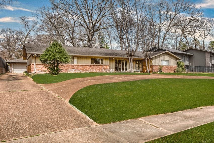 5680 North Angela Road Memphis, TN 38120 - Photo 2 of 33 View of front of house with board and batten siding and brick siding
