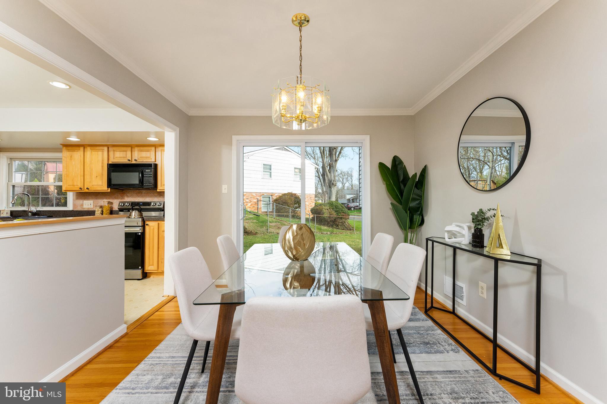7013 Galgate Drive Springfield, VA 22152 - Photo 3 of 58 DINING ROOM W/NEW SLIDING GLASS DOOR TO BACKYARD