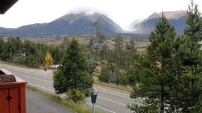 180 Evergreen Road, Unit 202E Dillon, CO 80435 - Photo 1 of 24 a view of a house with a yard and mountain view in back