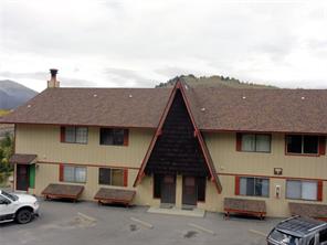 180 Evergreen Road, Unit 202E Dillon, CO 80435 - Photo 22 of 24 a front view of a house with parking space