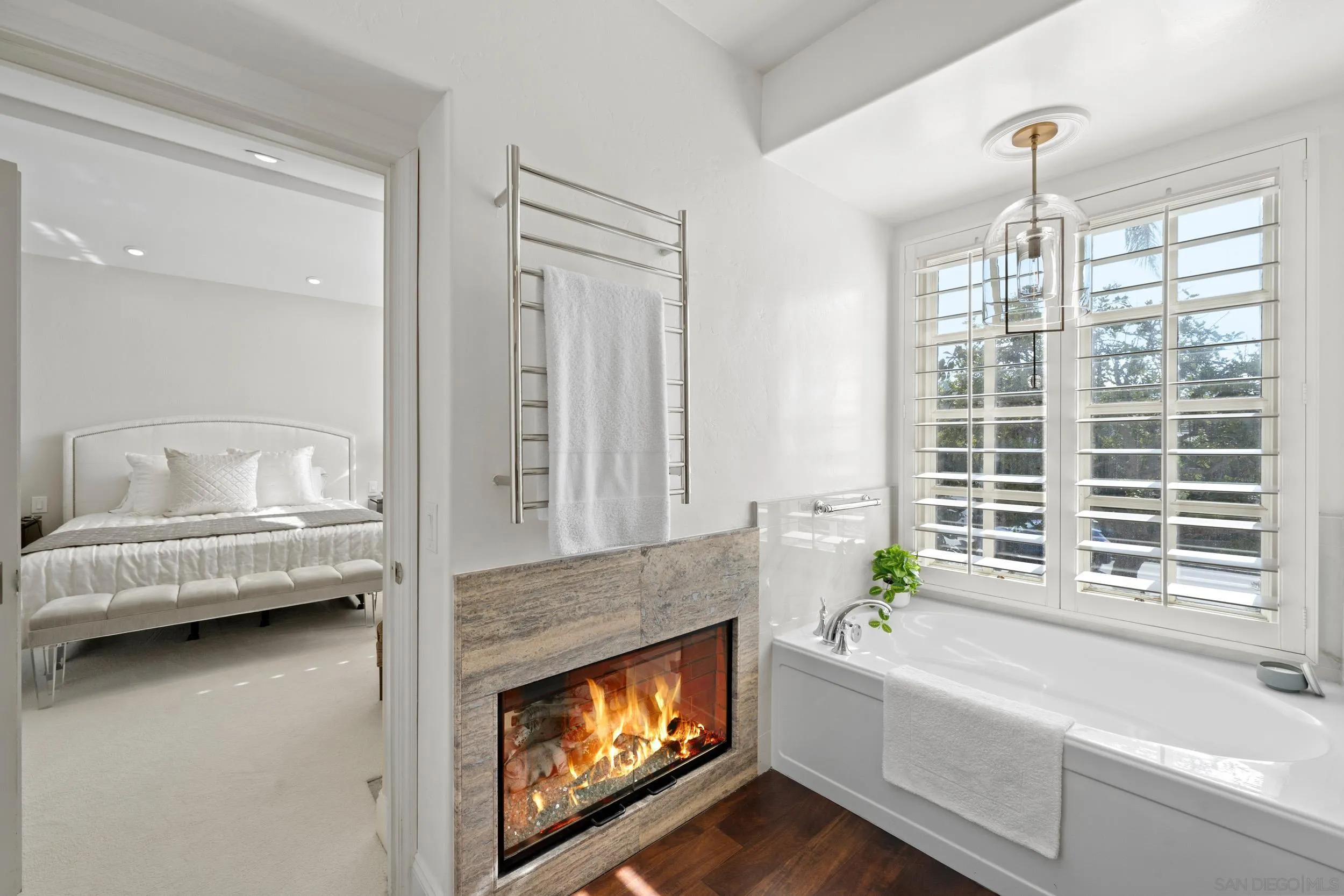 7723 Ivanhoe Avenue La Jolla, CA 92037 - Photo 17 of 35 a living room with furniture and a fireplace