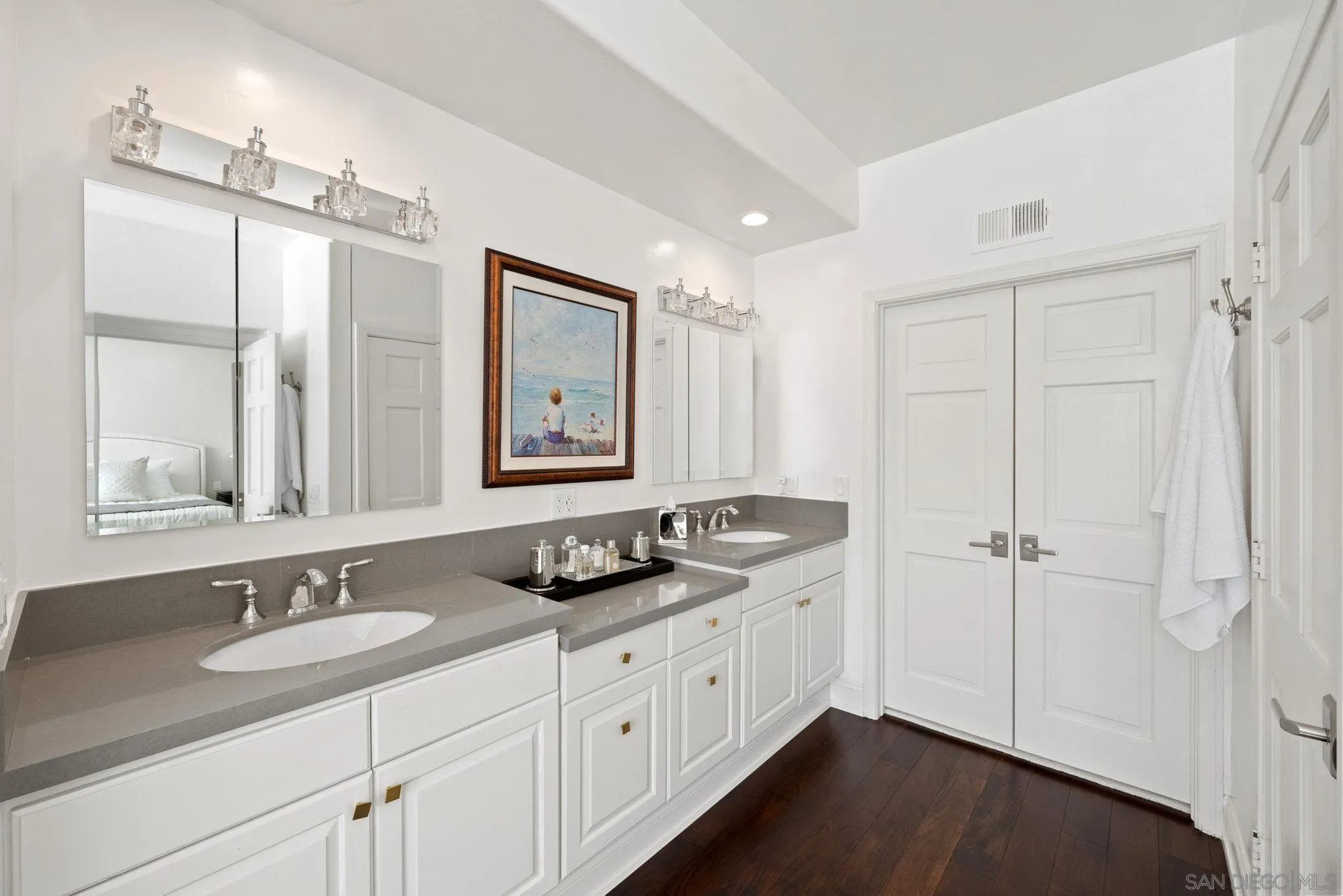 7723 Ivanhoe Avenue La Jolla, CA 92037 - Photo 19 of 35 a bathroom with a granite countertop sink and a mirror