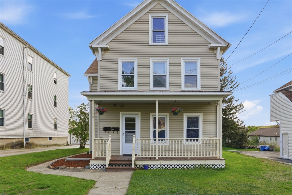12 Whitcomb Street Webster, MA 01570 - Photo 2 of 40 a front view of a house with a garden