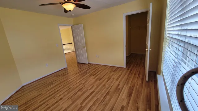 a view of a livingroom with wooden floor