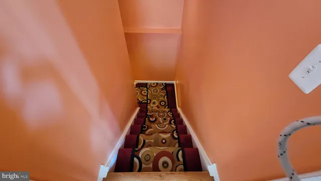 a kitchen with stainless steel appliances a sink and a refrigerator