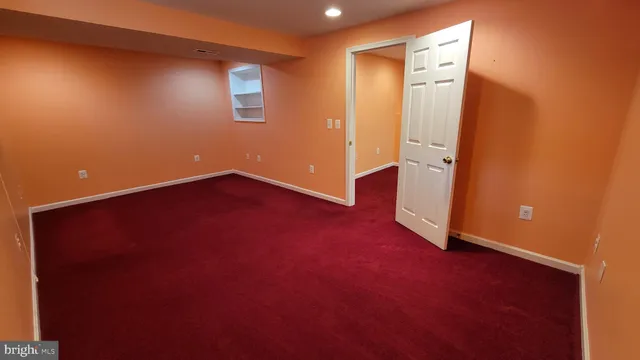 a bathroom with a toilet and a sink