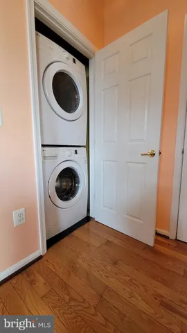 a view of a storage and utility room with washer and dryer