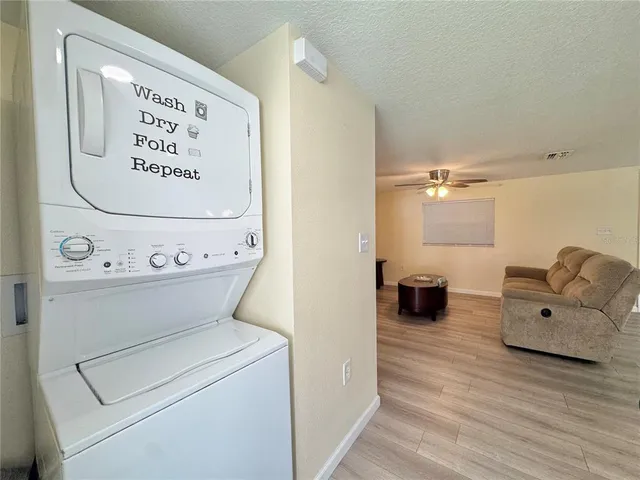 a view of livingroom with furniture and garden