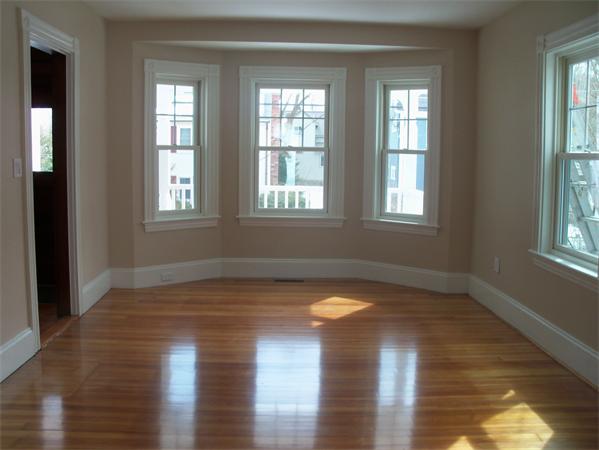 37 Cummings Road Newton, MA 02459 - Photo 8 of 26 a view of empty room with wooden floor and fan