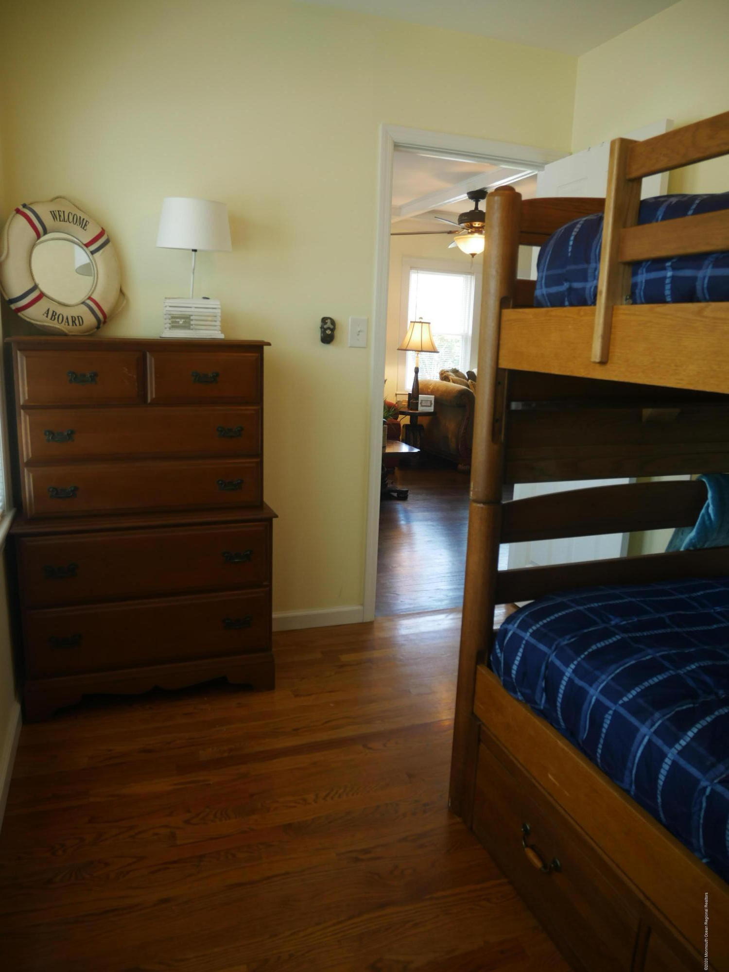 319 Arnold Avenue Point Pleasant Beach, NJ 08742 - Photo 20 of 34 a bedroom with a bed and cabinets